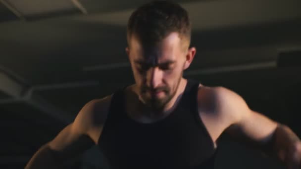 bearded brutal athlete trains in the hall - Filmagem, Vídeo