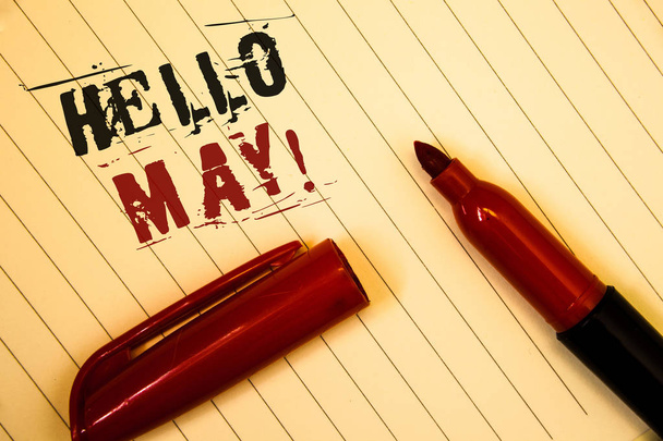 Text sign showing Hello May Motivational Call. Conceptual photo Starting a new month April is over SpringIdeas messages created on notebook page black red letters open pen resting - Photo, Image
