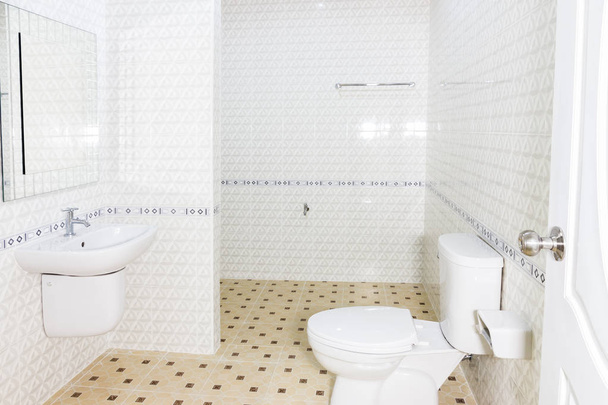 Modern design home bathroom toilet and sink White colur sanitary ware in the bathroom - Fotoğraf, Görsel