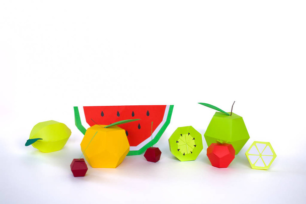 exotic fruits made of paper on white background - Foto, imagen