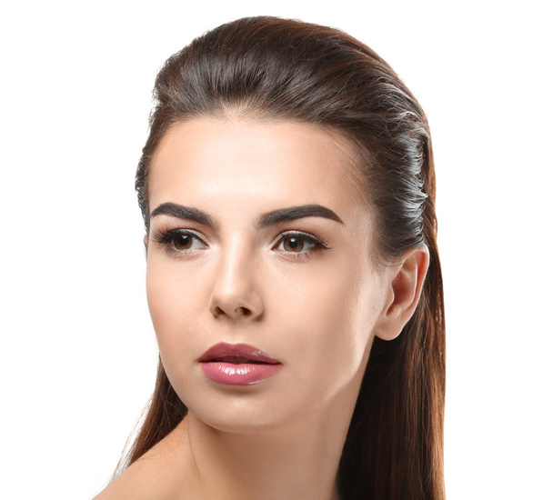 Young woman with beautiful eyebrows on white background - Foto, immagini