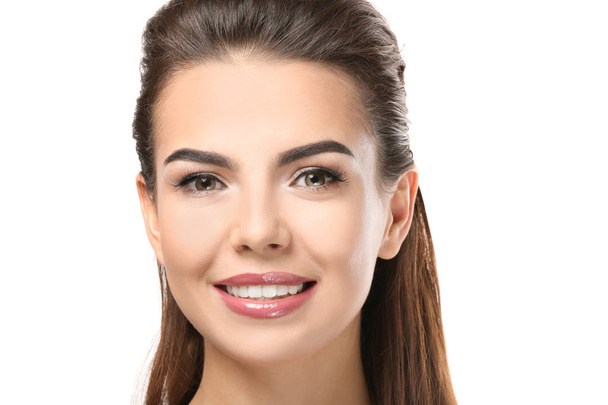 Young woman with beautiful eyebrows on white background - Φωτογραφία, εικόνα