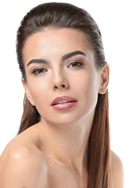 Young woman with beautiful eyebrows on white background - Foto, immagini