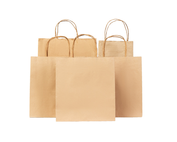 five Recycled paper shopping bags isolated on white background. - Photo, Image