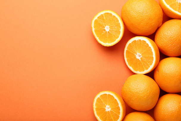 Pile of oranges on colorful background - Foto, immagini