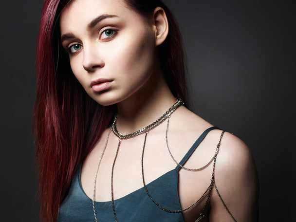 Sensual Girl with color hair and chain necklace on the shoulder. Beautiful sexy Young woman. Trendy Dyed Hair color - Foto, Imagem