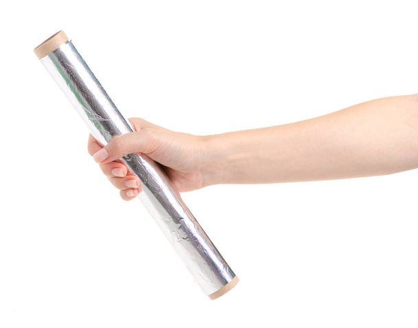 Foil roll in hand - Photo, Image