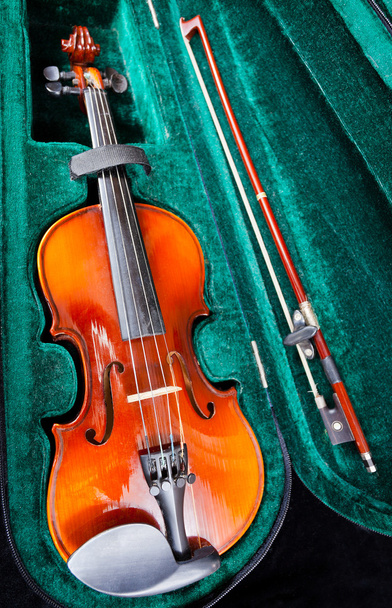 small violin with bow in green velvet case - Φωτογραφία, εικόνα