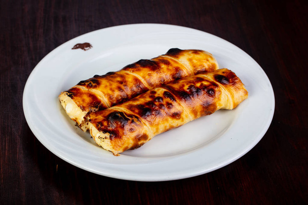 Grilled georgian suluguni cheese in the plate - Photo, Image
