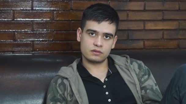 Portrait of a teenage looking at the camera. - Video, Çekim