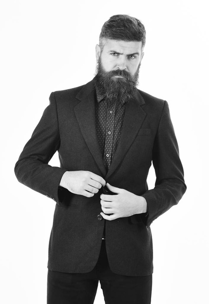 Brutal man with long beard and serious face. Leadership, success, luxury lifestyle, elegance, rich, business concept. CEO in smart clothes. - Photo, image
