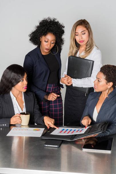 Group of businesswomen working together in an office - Foto, Imagen