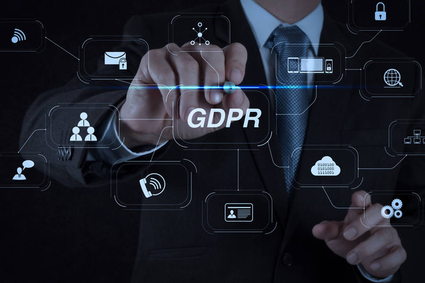 GDPR. Data Protection Regulation with Cyber security and privacy virtual diagram.businessman hand writing in the whiteboard or virtual screen - Photo, Image