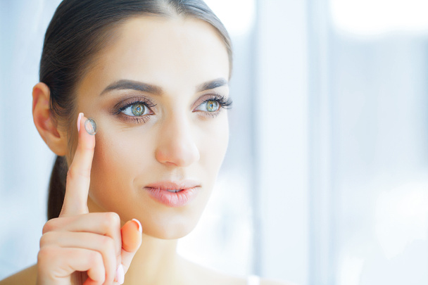 Health. Happy Woman with Contact Lenses on the Finger. Eye Care. Good Vision. Girl with Green Eyes. - Photo, Image