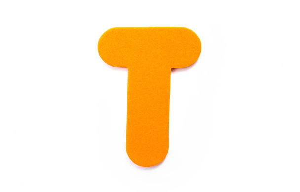Orange Letter T over a white background. - Photo, image