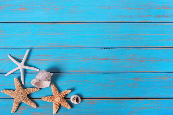 Summer beach seashore background starfish blue old wood paint peeling - Photo, Image