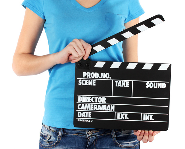 Movie production clapper board in hands isolated on white - Foto, Imagen