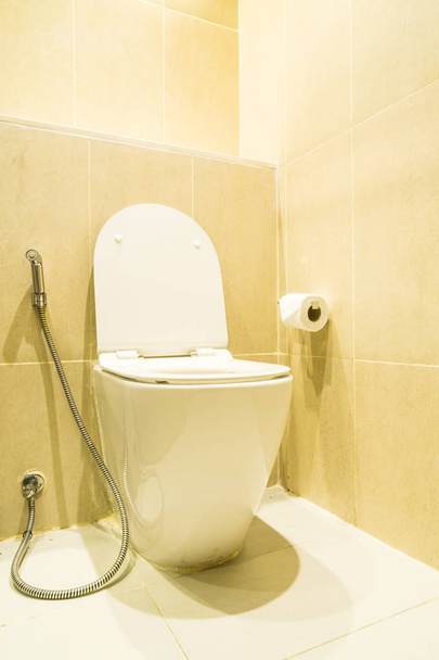 White toilet bowl seat decoration in bathroom interior - Fotoğraf, Görsel