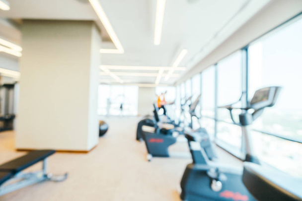 Abstract blur and defocused fitness equipment in gym interior for background - Photo, Image