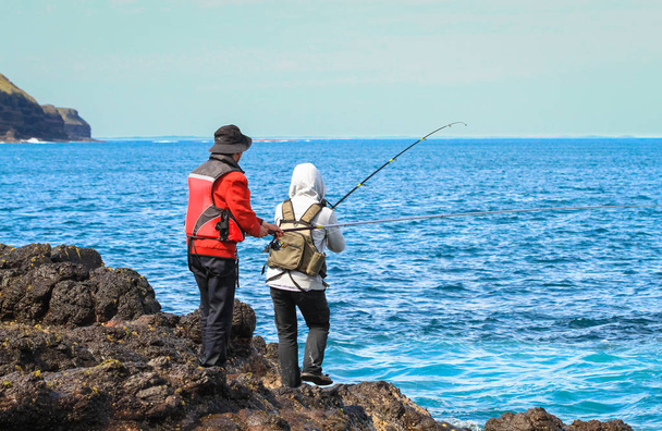 Twee vissers op de Kaap Schank, Victoria, Australië. - Foto, afbeelding