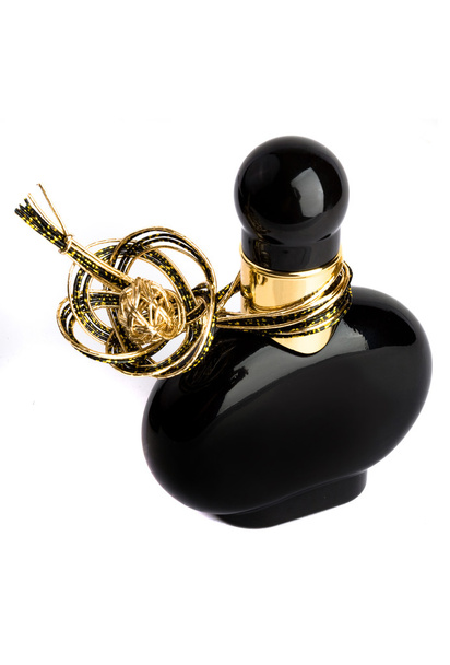 Black and gold perfume bottle - Фото, зображення