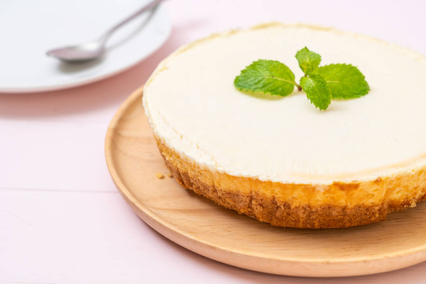 Homemade cheesecake  with mint on wood background - Photo, Image