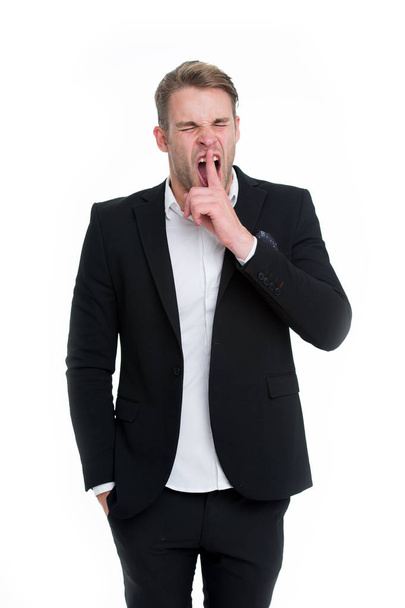 Man bored yawning white background. Fed up with this. Man dislike boring formal rules at workplace. Guy wears boring formal suit according to business dress code. Secret gesture. Do not tell someone - Zdjęcie, obraz
