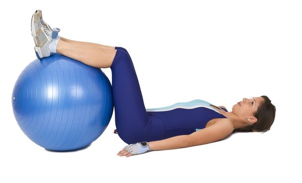 Woman with a gym ball - Foto, imagen