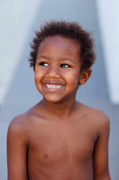 funny and happy African little boy , closeup  - Фото, зображення