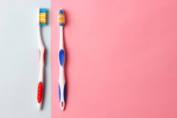 toothbrushes on a colored background top view. oral health, brush your teeth, healthy teeth - Photo, Image