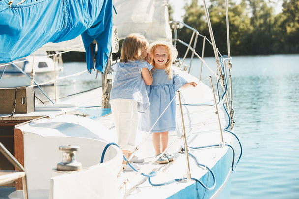 The children on board of sea yacht - Foto, Imagen