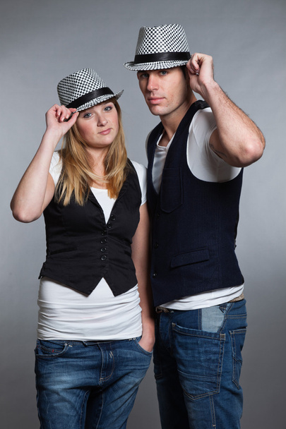 Happy young couple man and woman in love. Wearing hat. - Foto, Imagem