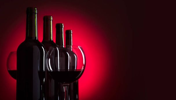 Glazen en flessen rode wijn, kopie ruimte voor uw tekst. - Foto, afbeelding