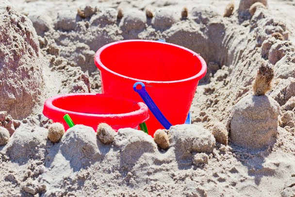 Red bucket in the sand - Photo, Image
