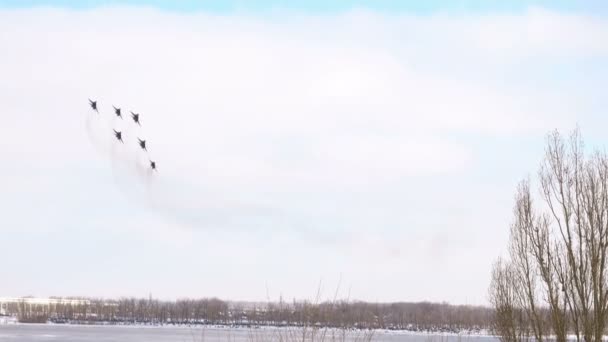 Volgograd, Russian Federation - February 02, 2018: Aerobatics performed by aviation group of Military-air forces of Russia "Strizhi". - Video