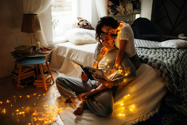 Romantic young  couple in love embracing at home - Photo, Image