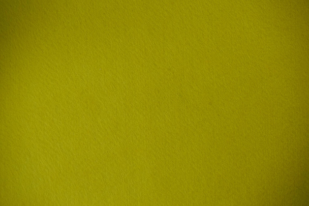 Donker geel voelde textuur achtergrond - Foto, afbeelding