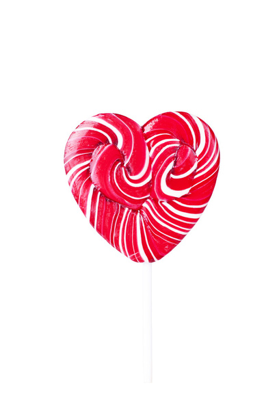 Single Valentines Day heart-shaped lollipop isolated on white - Foto, Bild