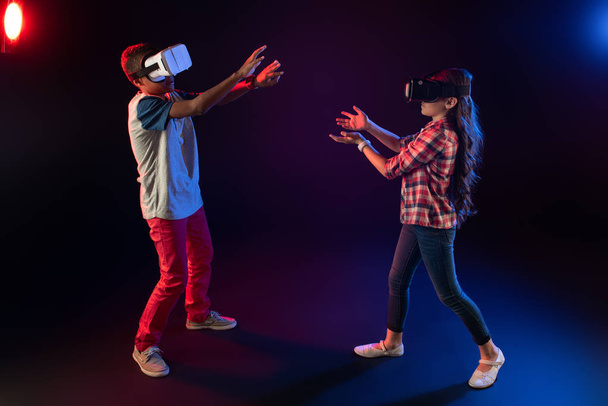 Playful best friends playing VR games - Photo, image