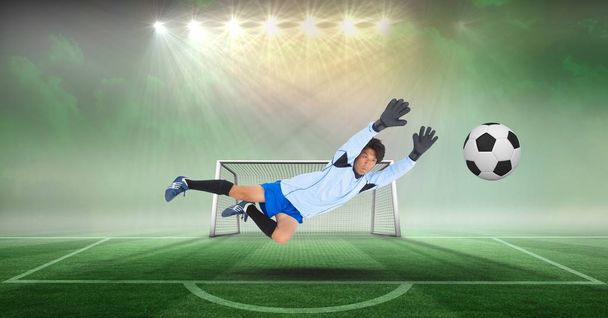 Digital composite of Composite images of soccer goalkeeper with ball on soccer field - Φωτογραφία, εικόνα