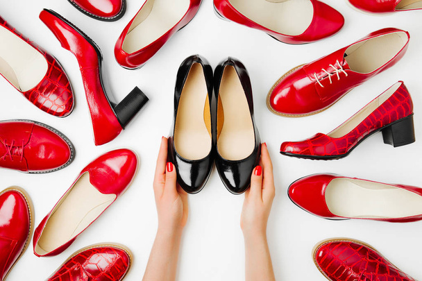 Stylish female spring or autumn shoes in red colors. Beauty and fashion concept. Flat lay, top view - Фото, зображення