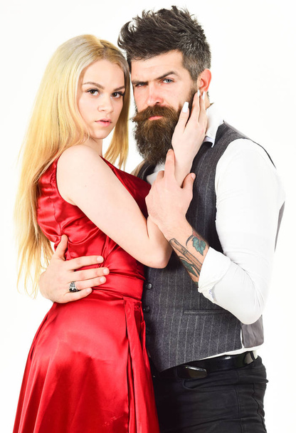 Couple in love, passionate dancers in elegant clothes, white background. Woman in red dress and man in vest. Dancing couple concept. Bearded hipster and attractive lady dressed up for dancing contest - Fotografie, Obrázek