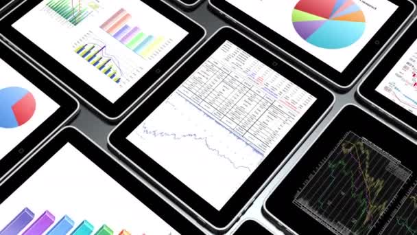 4k Mobile devices,finance pie charts & stock trend diagrams in the ipad. - Footage, Video