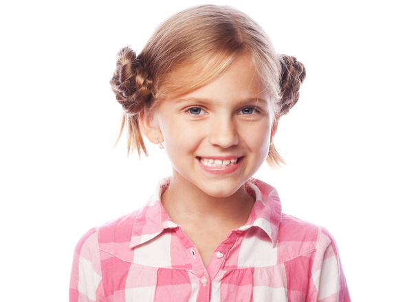 Portrait of a happy little girl over white background - Foto, Imagen