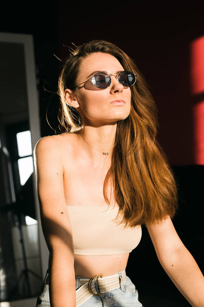 Portraits of beautiful brunette girl in sunglasses - Valokuva, kuva