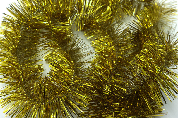 Christmas tree tinsel yellow - Foto, afbeelding