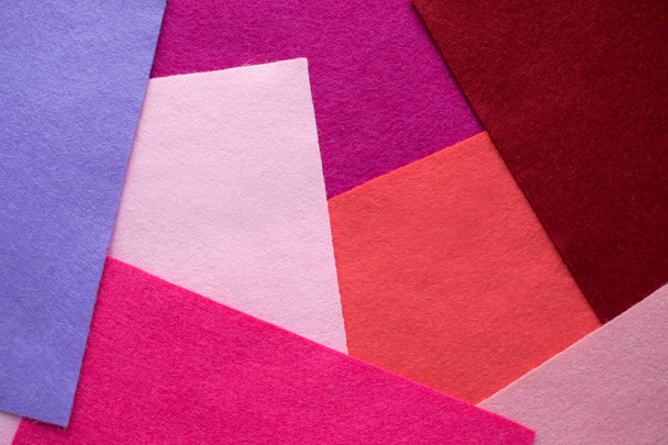 Wentylator kolorowych jasnofilcowych materiałów włókienniczych. Próbki miękkich klap filcowych w różnych kolorach. Rzemieślnicze, abstrakcyjne tło rękodzieła do produkcji ręcznej i kreatywnej - Zdjęcie, obraz