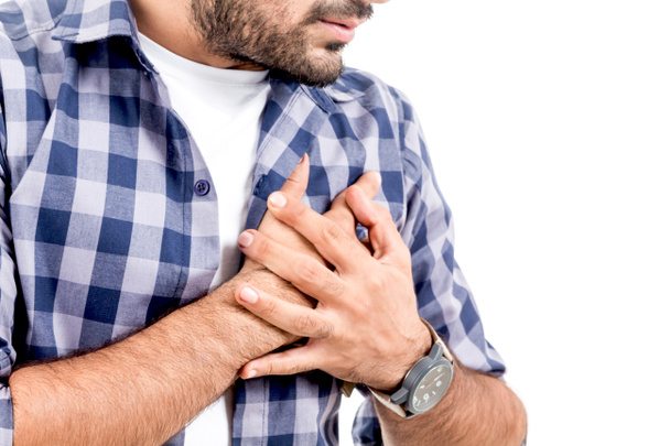 Člověk trpící bolestí na hrudi - srdeční infarkt  - Fotografie, Obrázek