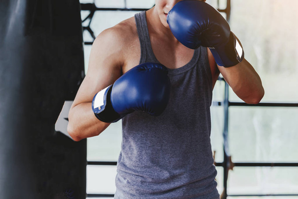 Sportman with boxing gloves - Fotó, kép