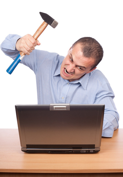 Angry businessman at laptop - Foto, afbeelding